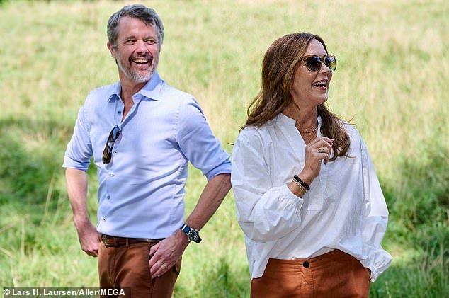 King Frederik, 56, looked dapper in a fitted blue shirt, brown trousers and boots as he took part in the royal summer tour